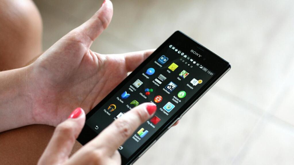 El móvil en la mano