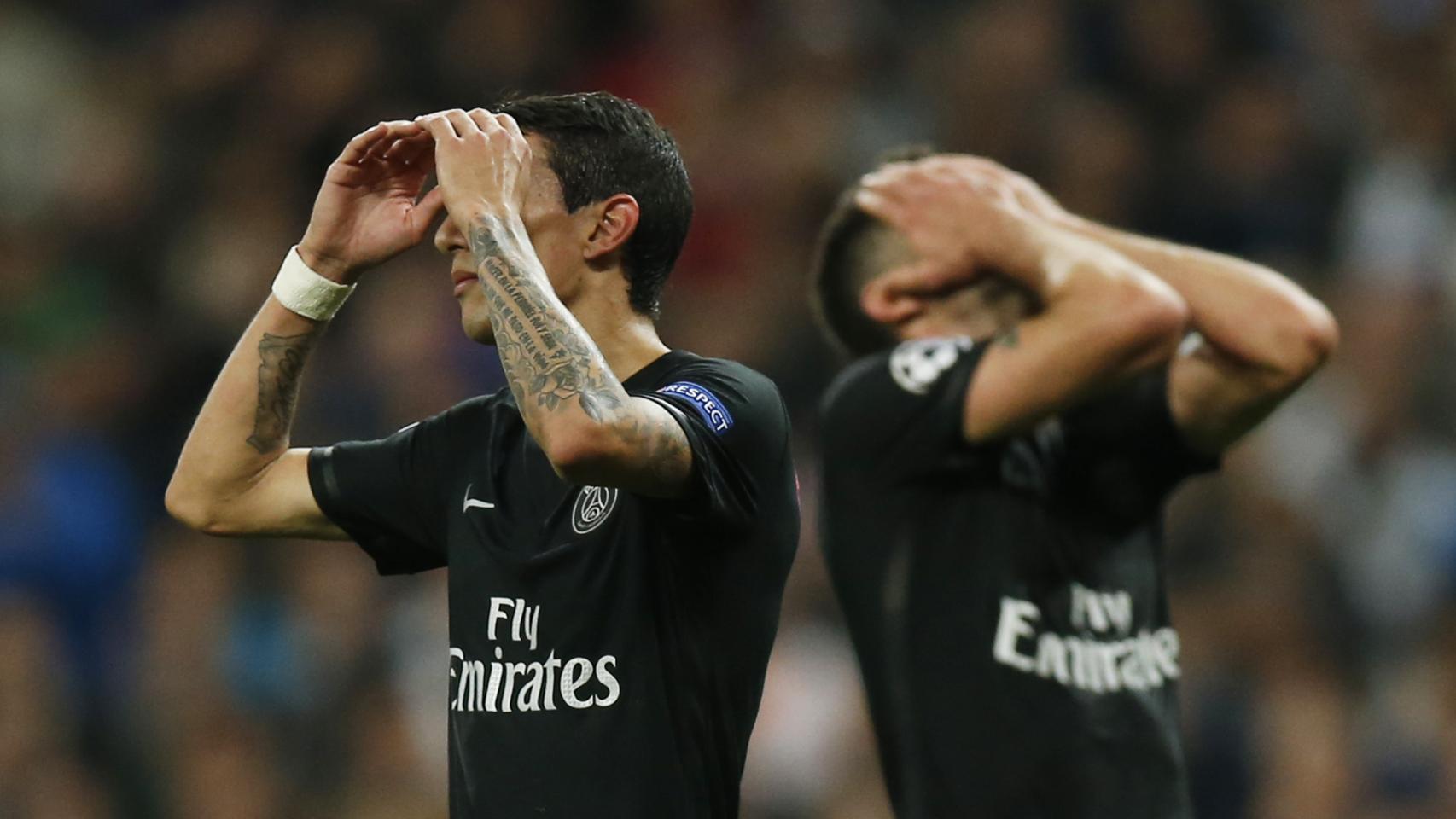 Di María y Motta se lamentan durante el encuentro.