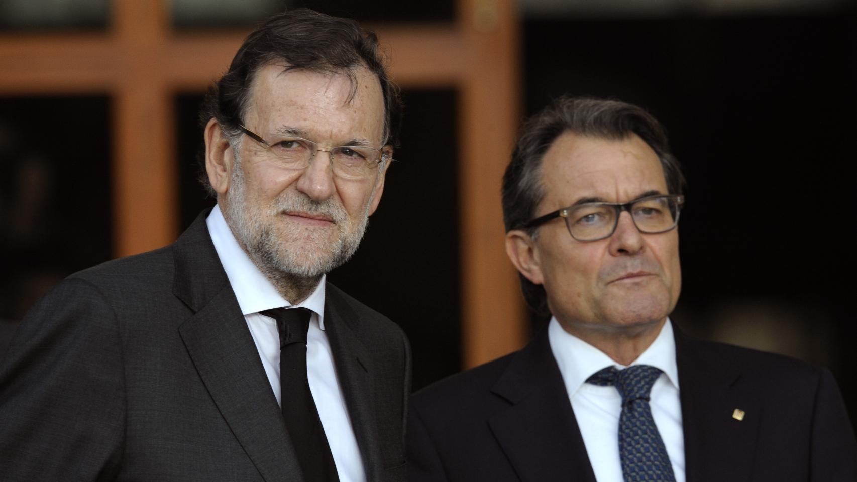 En esta imagen con Artur Mas no tiene canas