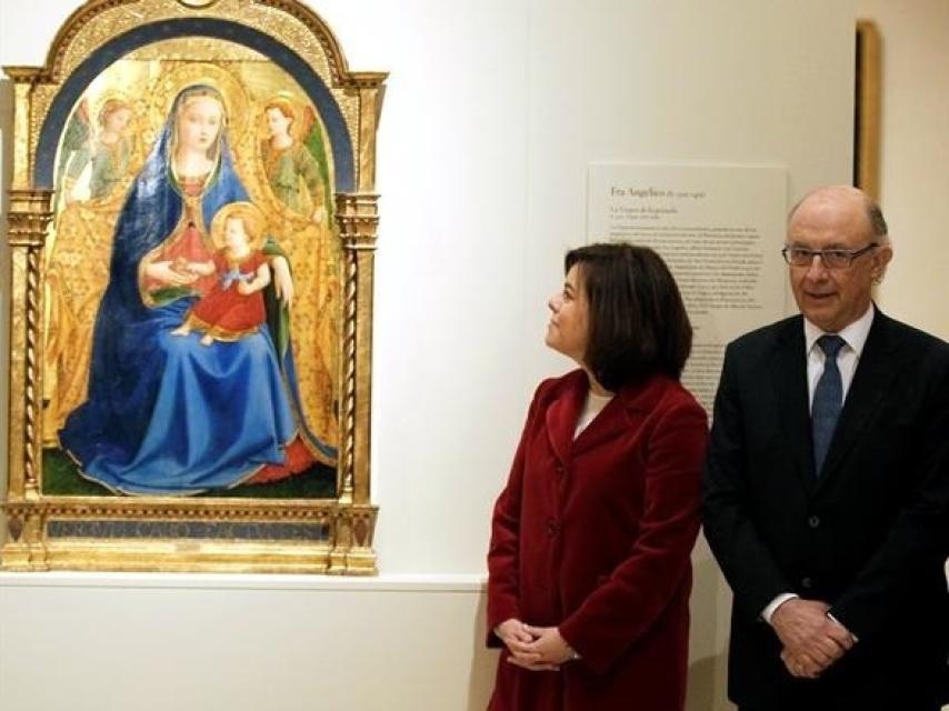 Soraya Sáenz de Santamaría y Cristóbal Montoro, junto al Fra Angelico.