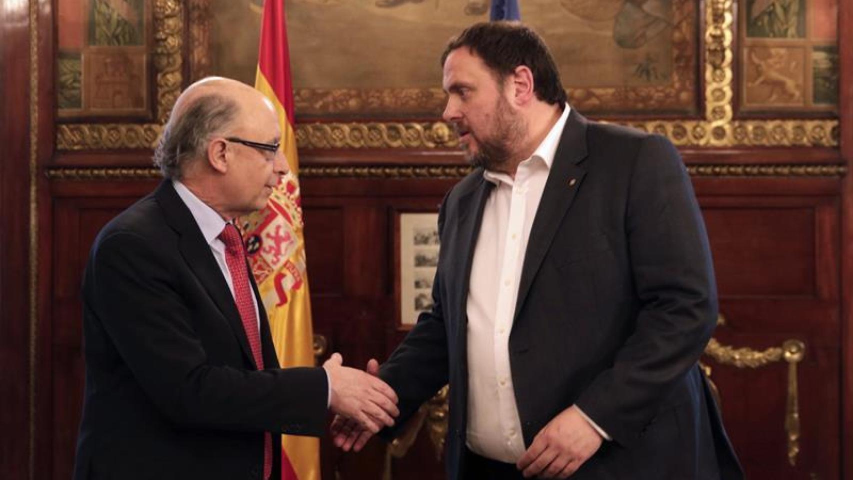 Cristóbal Montoro y Oriol Junqueras en el Ministerio de Hacienda