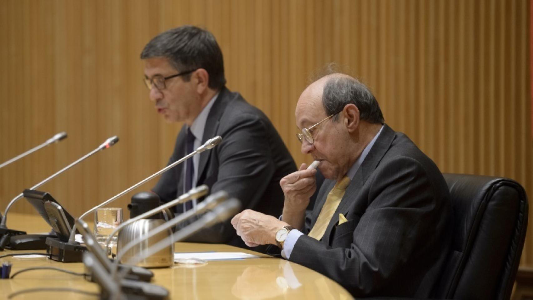 Patxi López y Franisco Rico durante la lectura del discurso.
