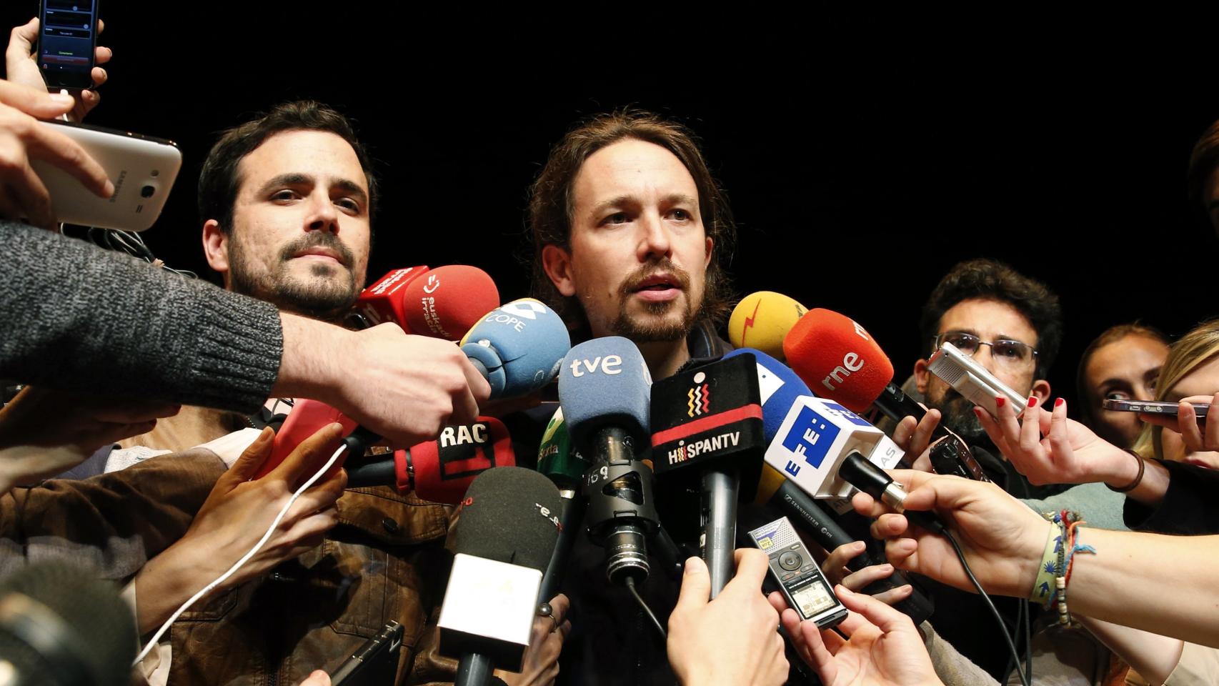 Alberto Garzón y Pablo Iglesias tras anunciar su acuerdo.