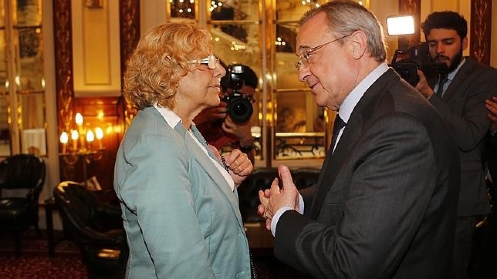 Manuela Carmena y Florentino Pérez.