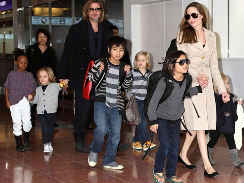 En compañía de su familia (numerosa).