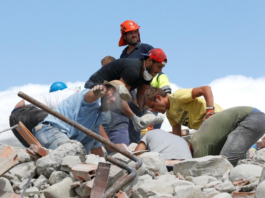 Rescuers work following an earthquake in Amatrice