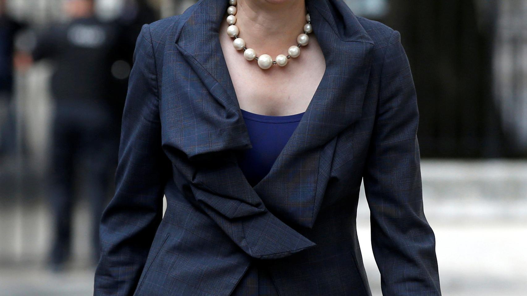 Britain's Prime Minister Theresa May walks to a meeting at the Ministry of Defence in London