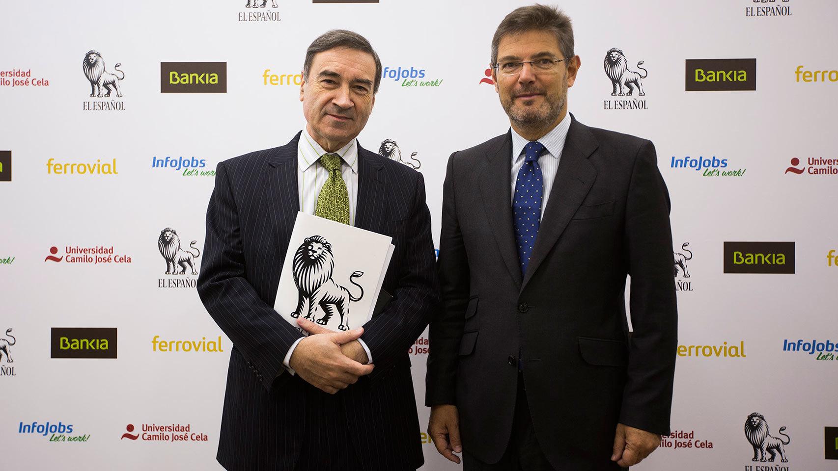 El ministro de Justicia, Rafael Catalá, y el director de EL ESPAÑOL, Pedro. J Ramírez.
