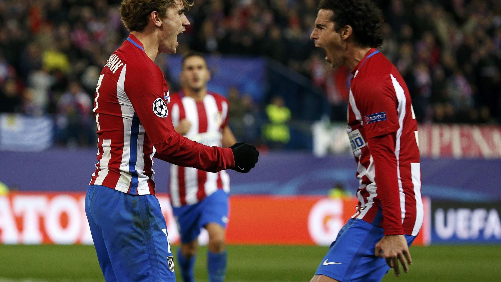 Griezmann celebra un gol con Tiago.