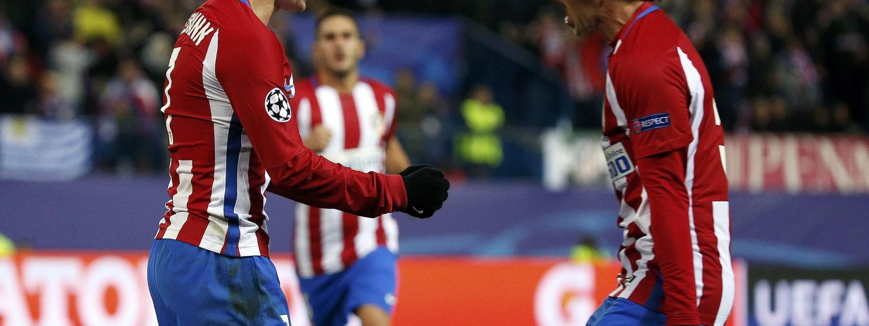 Griezmann celebra un gol con Tiago.