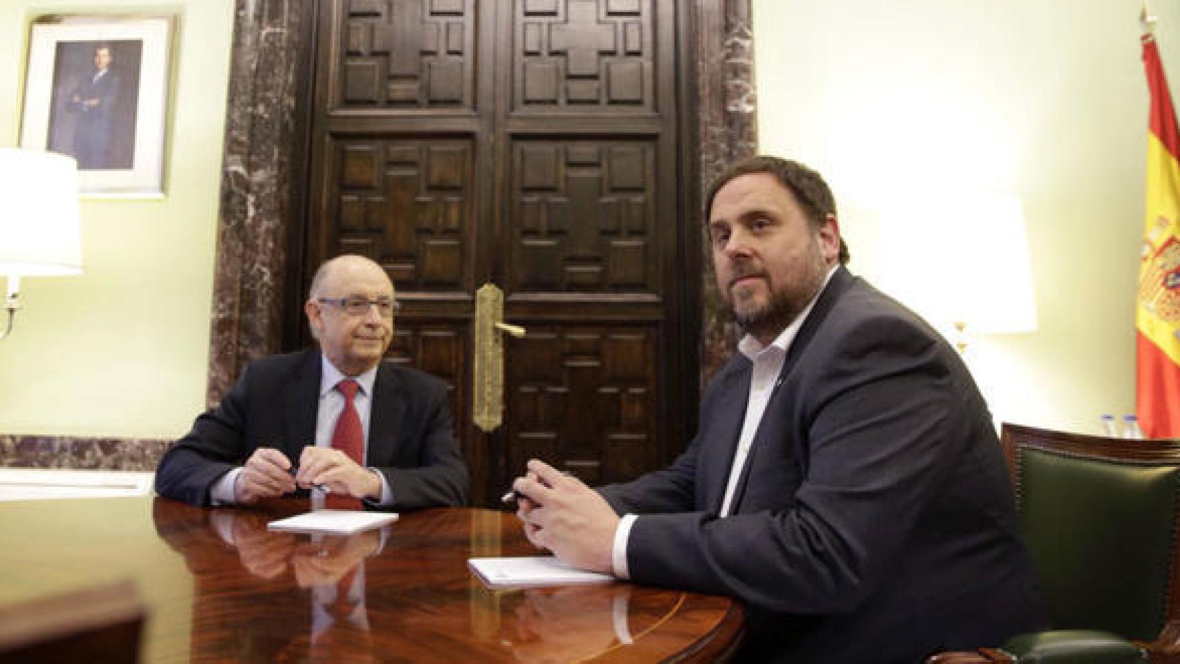 Cristóbal Montoro y Oriol Junqueras.