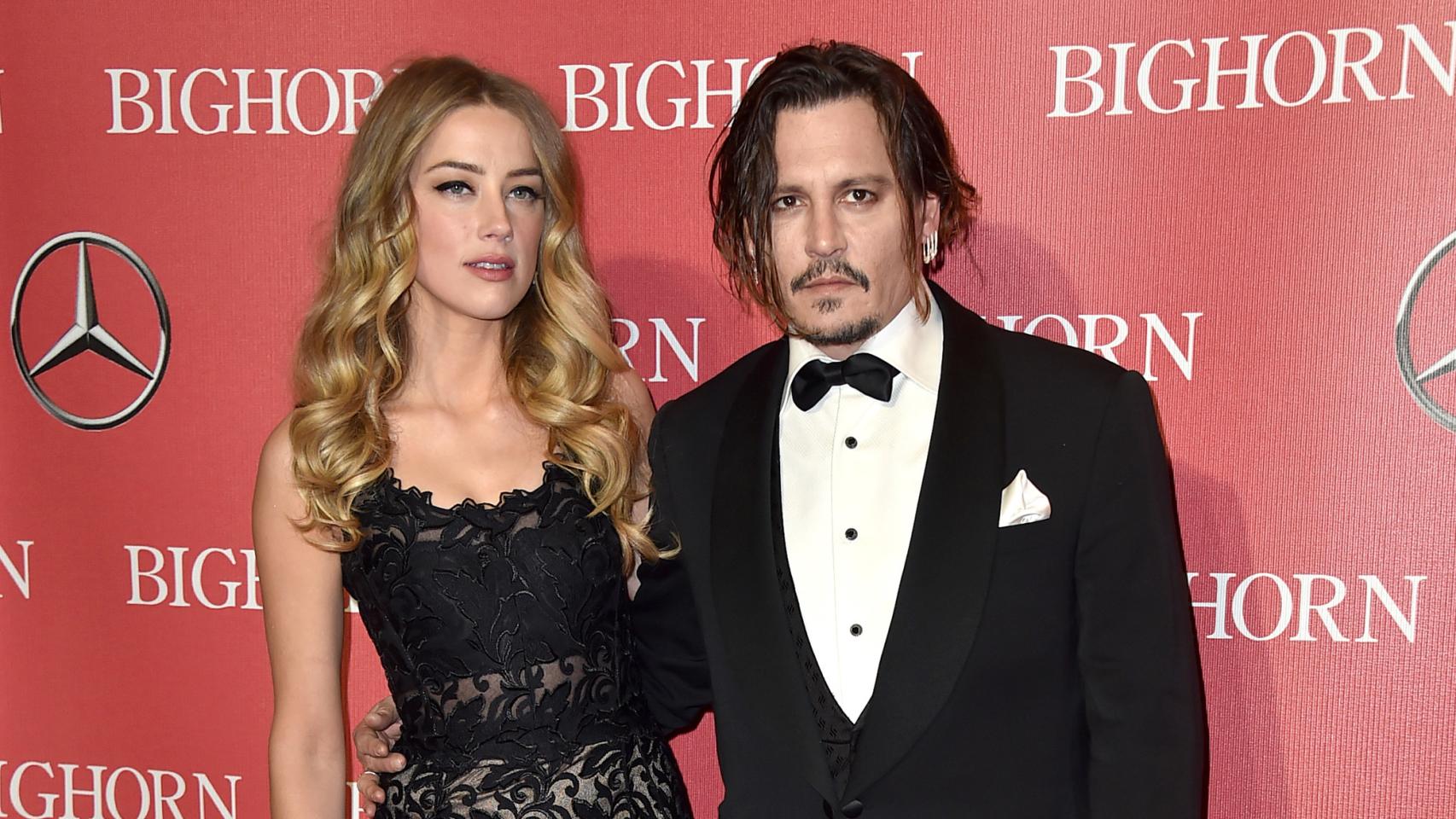 Amber Heard y Johnny Depp en un photocall en enero de este año.