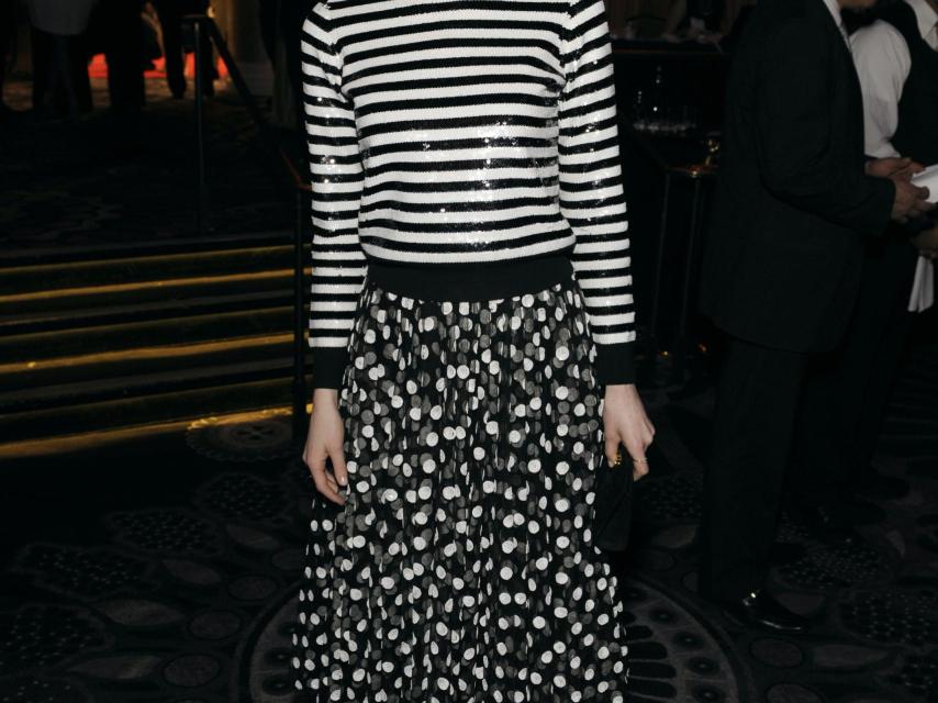 Emma Stone posa a su llegada  aun evento al otro lado del charco.