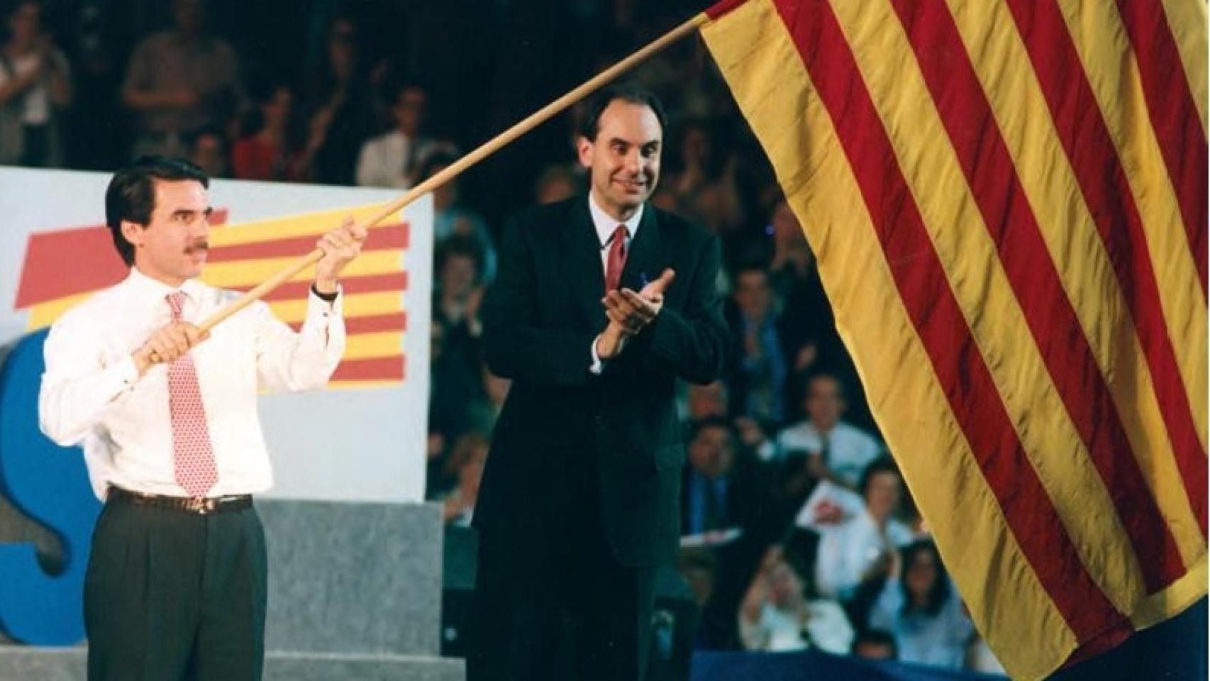Aznar y Vidal-Quadras en un mitin del PP, en Barcelona, en 1995.