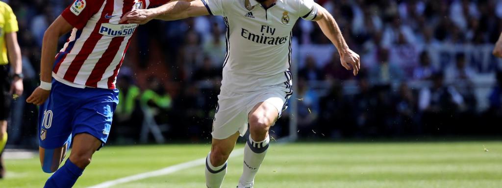 Koke y Cristiano Ronaldo durante el partido de Liga.