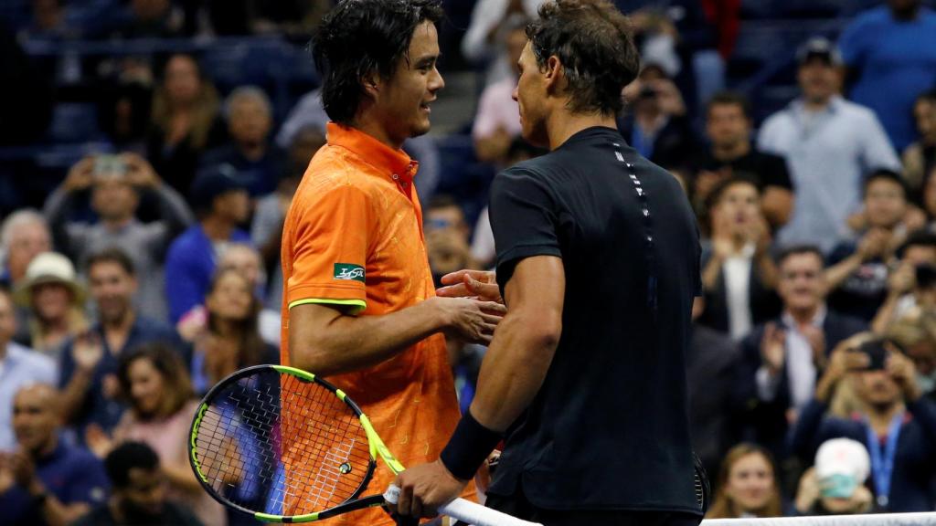 Nadal y Daniel se saludan tras el partido del US Open.