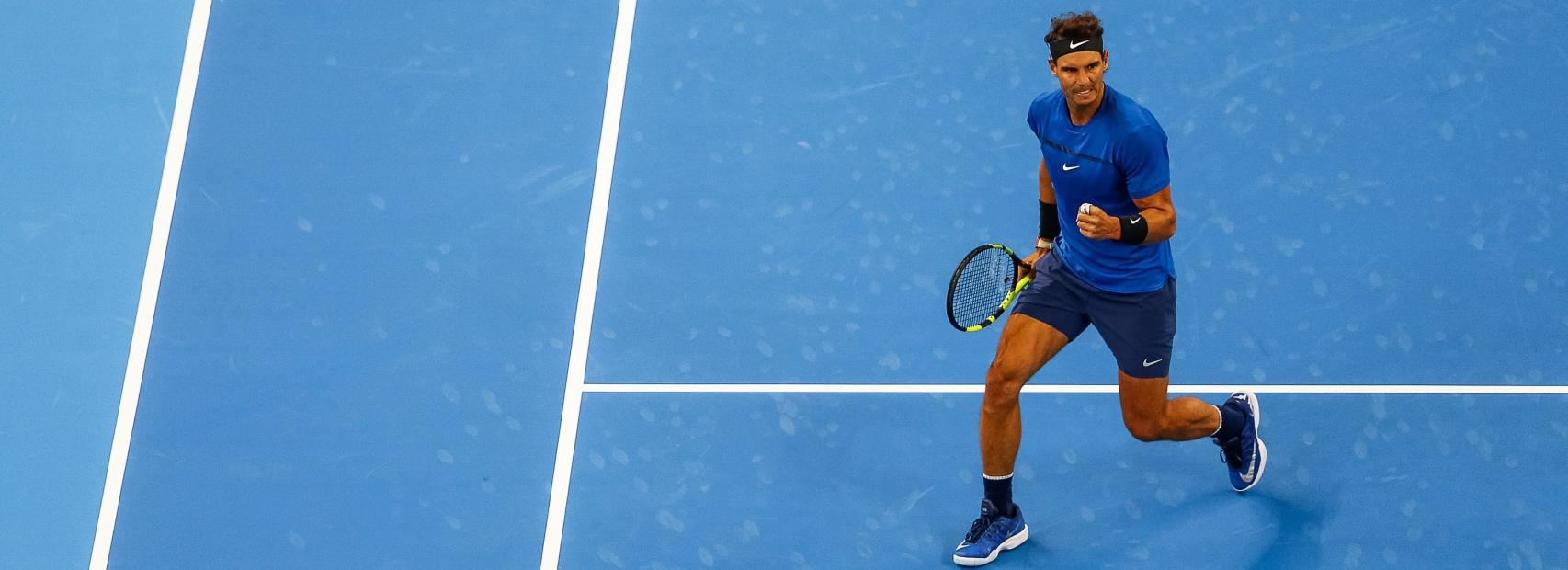Nadal, celebrando un punto ante Pouille en Pekín.