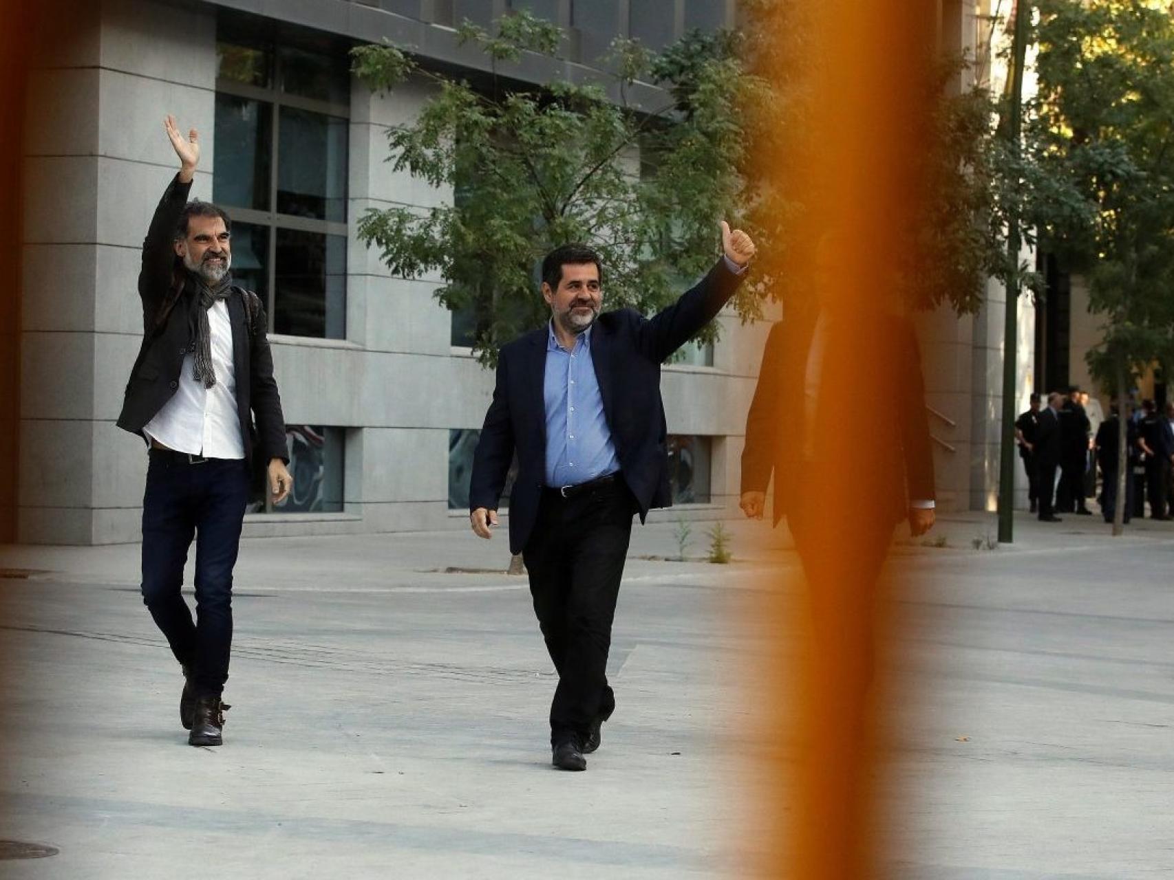 Jordi Cuixart (izquierda) y Jordi Sánchez entrando a la Audiencia Nacional.