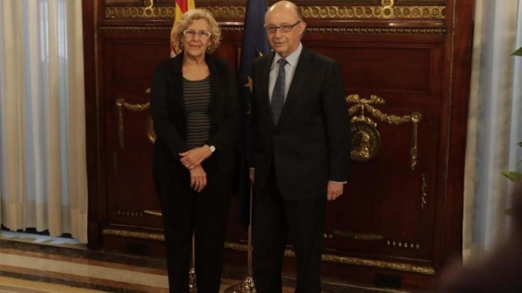Carmena y Montoro, tras una reunión.