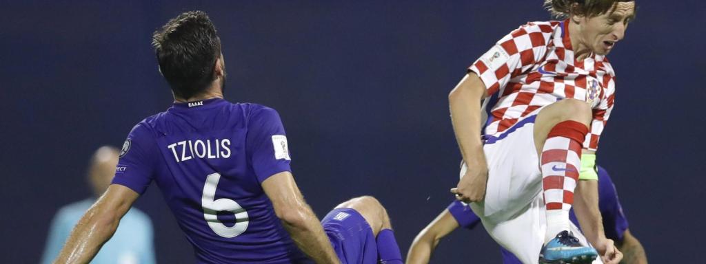 Tziolis y Modric en la ida.