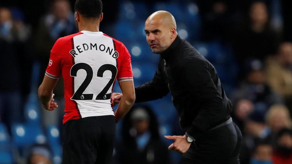 Guardiola, en el momento en el que se encara con Redmond, futbolista del Southampton.