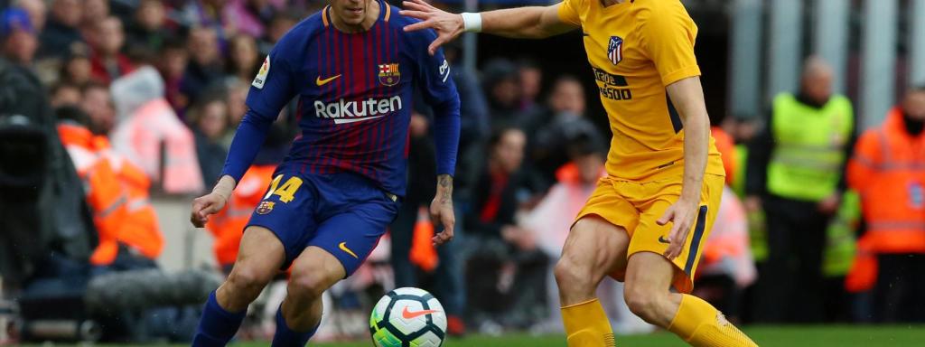 Coutinho y Filipe Luis en el Barcelona - Atlético.