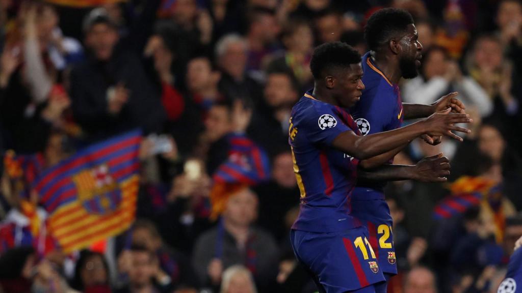Umtiti con Dembélé.