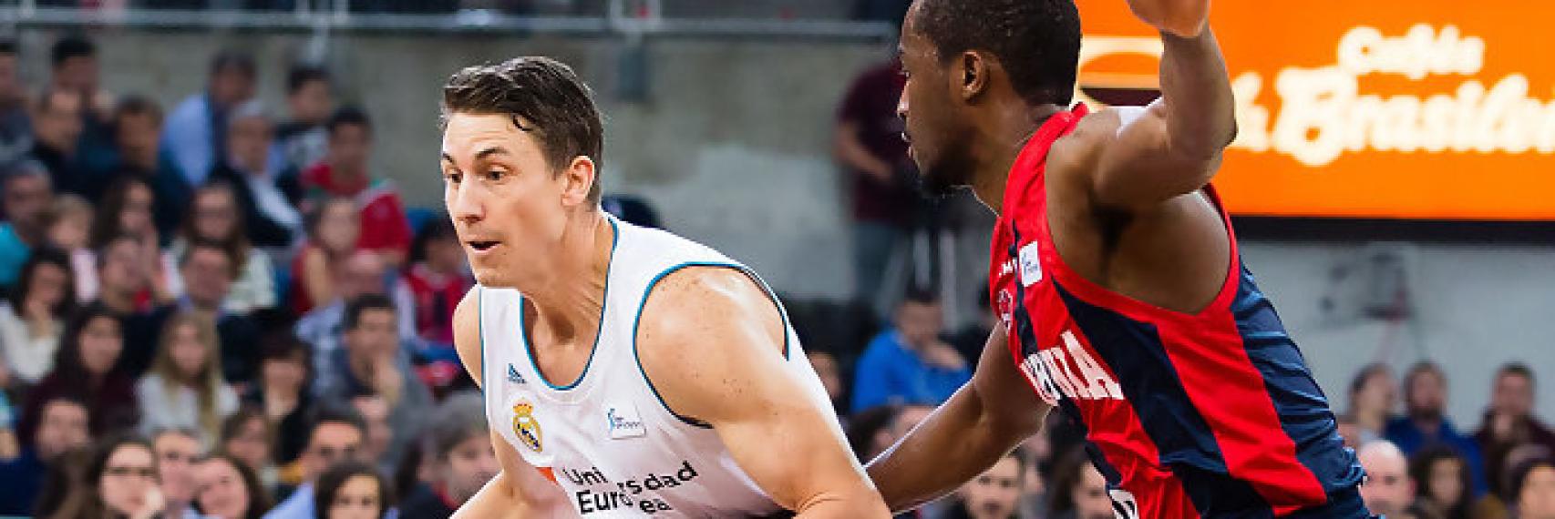 Jaycee Carroll y Rodrigue Beaubois.