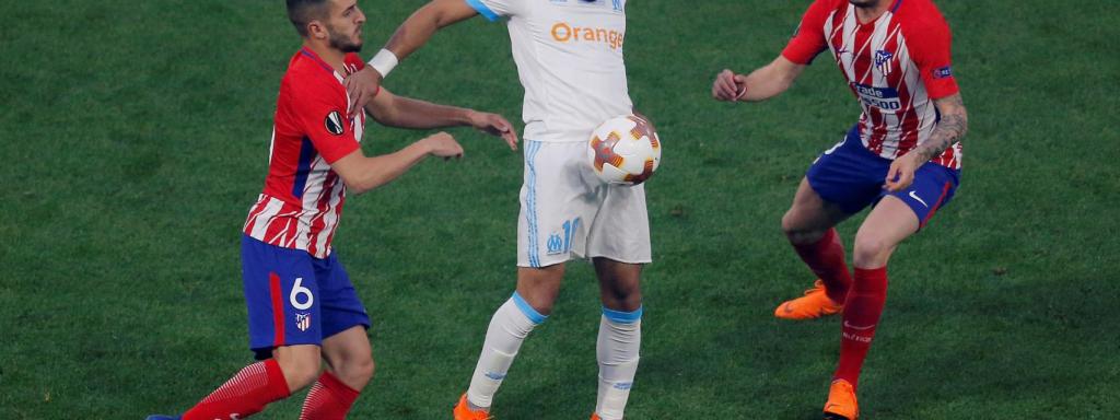 Koke, Payet y Saúl durante el Olympique de Marsella - Atlético de Madrid.