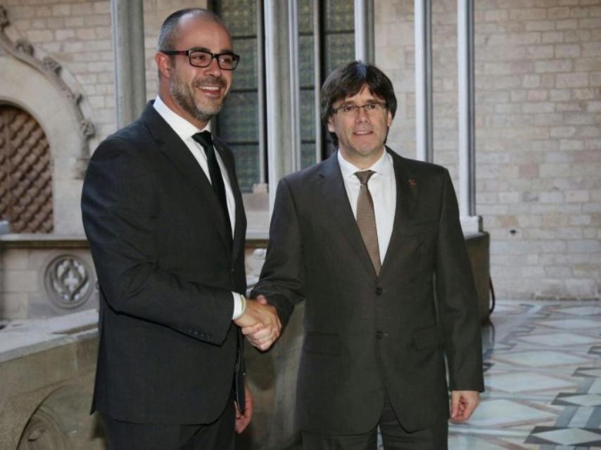 Miquel Buch y el ex presidente Puigdemont.