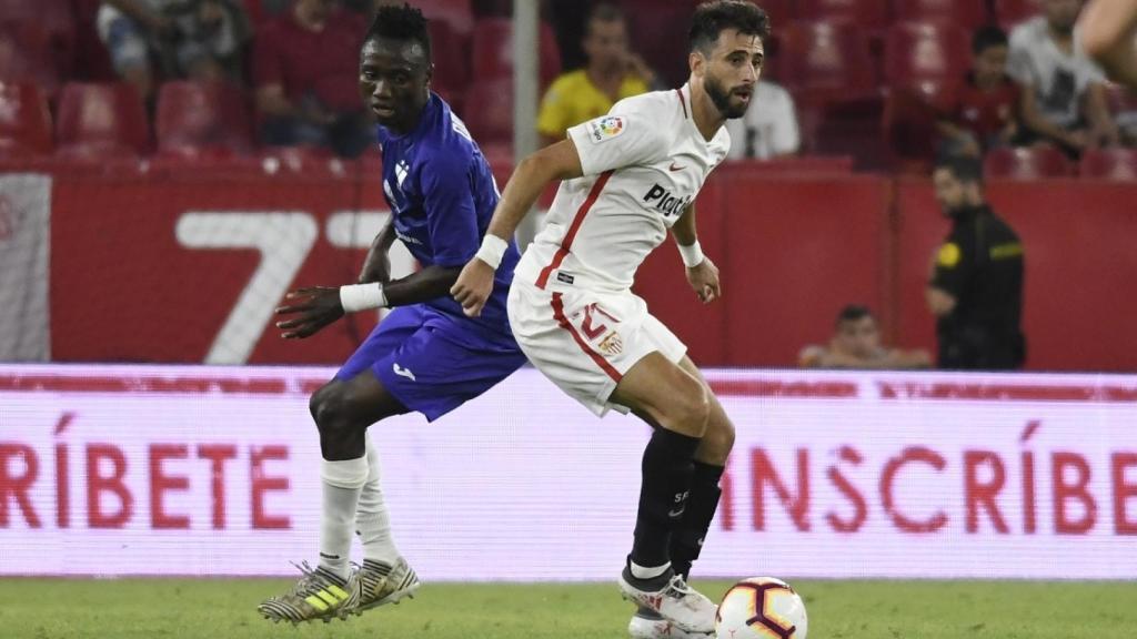 Pareja en un partido de pretemporada. Foto: sevillafc.es