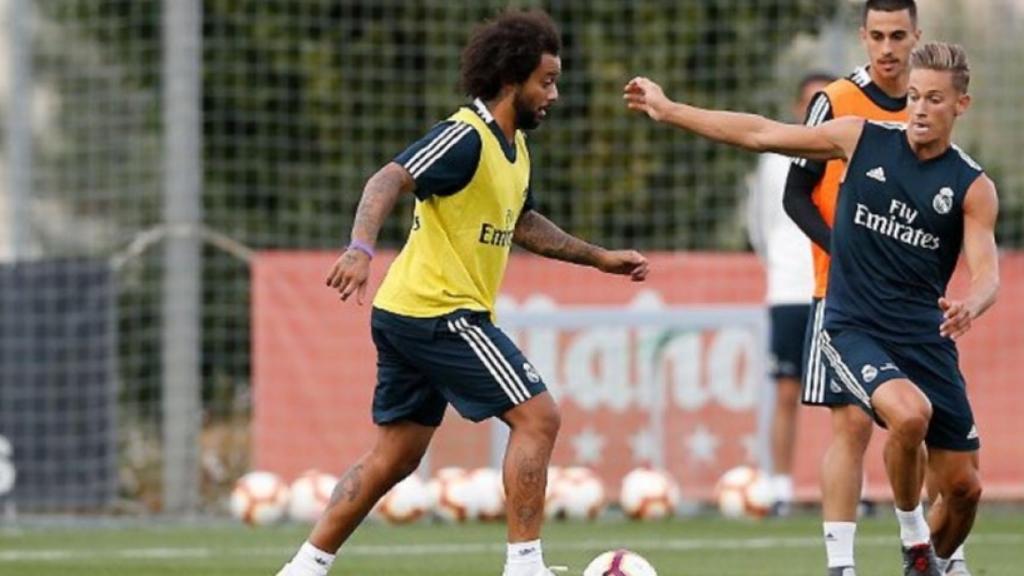 Marcelo, en un entrenamiento del Real Madrid con Marcos Llorente
