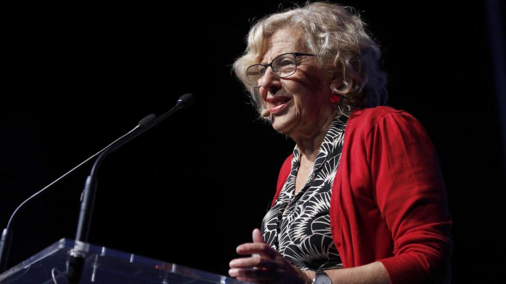 Manuela Carmena, durante la inauguración de un evento económico en Madrid este verano.