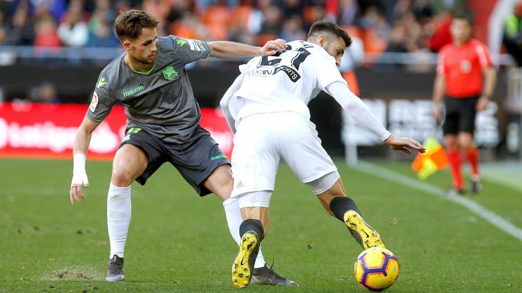Januzaj y Piccini durante el Valencia - Real Sociedad