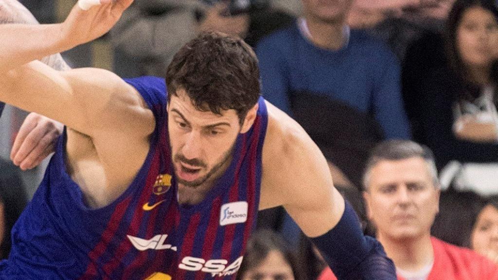 Tomic junto a Whittington durante un momento de partido