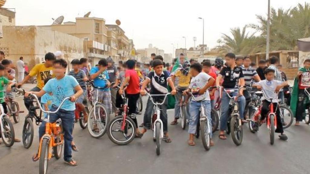 Murtaja Qureiris durante una bicicletada cuando tenía menos de 13 años.