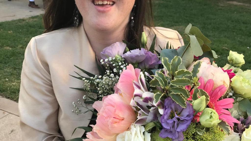 Blanca celebrando su recién obtenido título en terapia Ocupacional