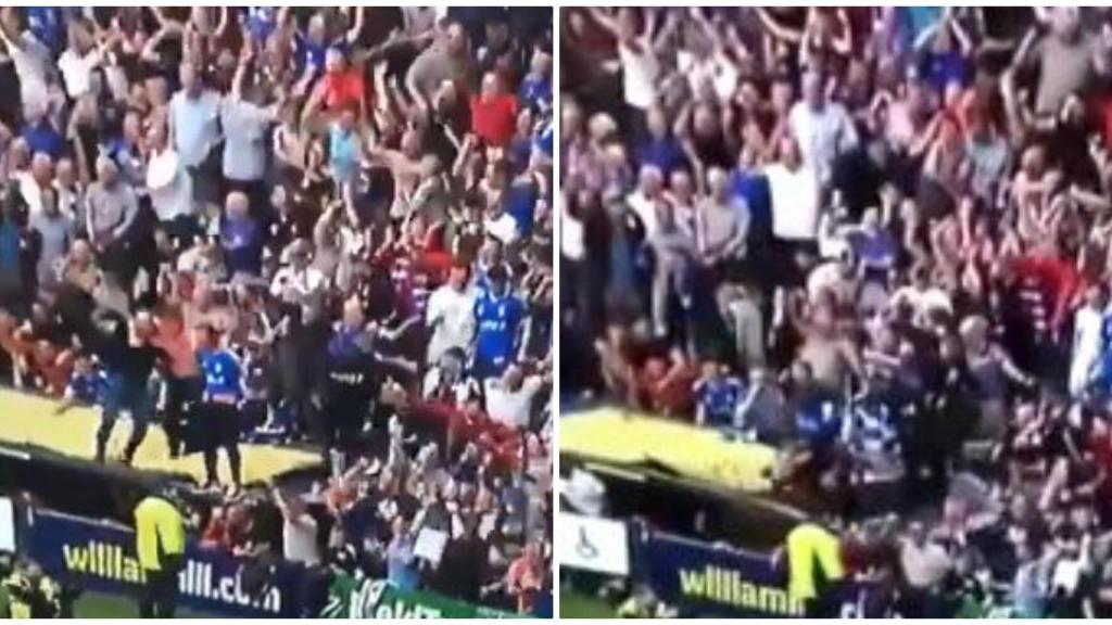 Los aficionados del Glasgow celebran un gol de su equipo