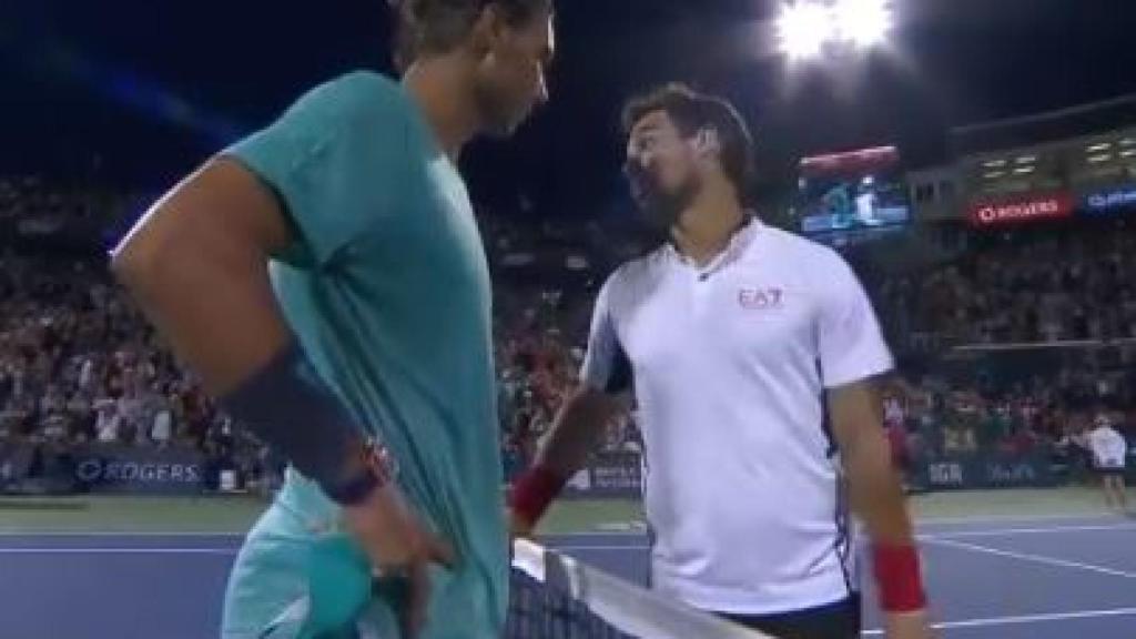 Rafa Nadal hablando con Fognini tras un partido.