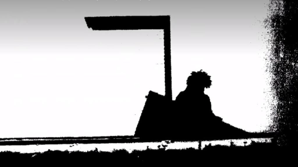 Fotografía extraída del sumario en la que se aprecia a Quezada retirando objetos del lugar donde estaba enterrado el niño