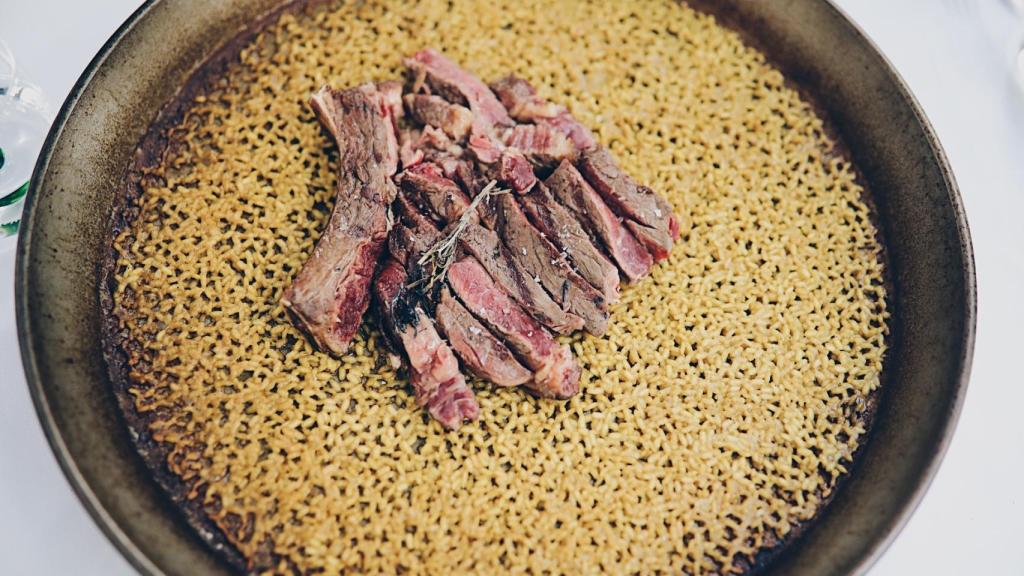 Lobito de Mar. Madrid. Arroz de chuleta ahumado al sarmiento