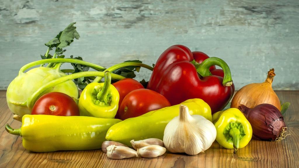 Un bodegón con una variedad de verduras.