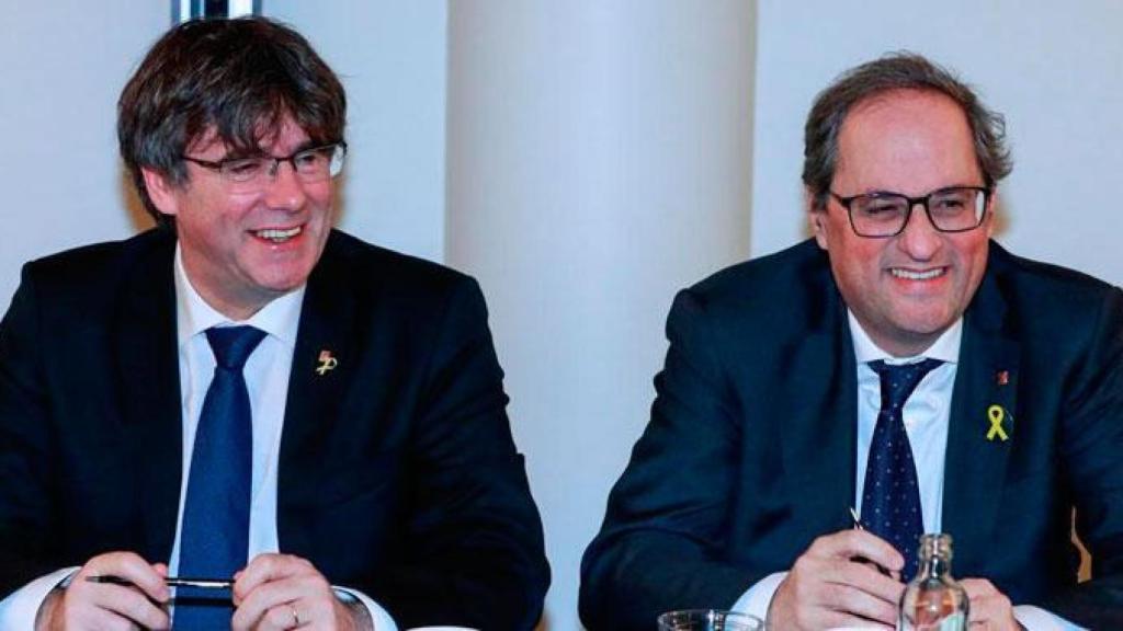 El president Quim Torra junto al ex Carles Puigdemont.
