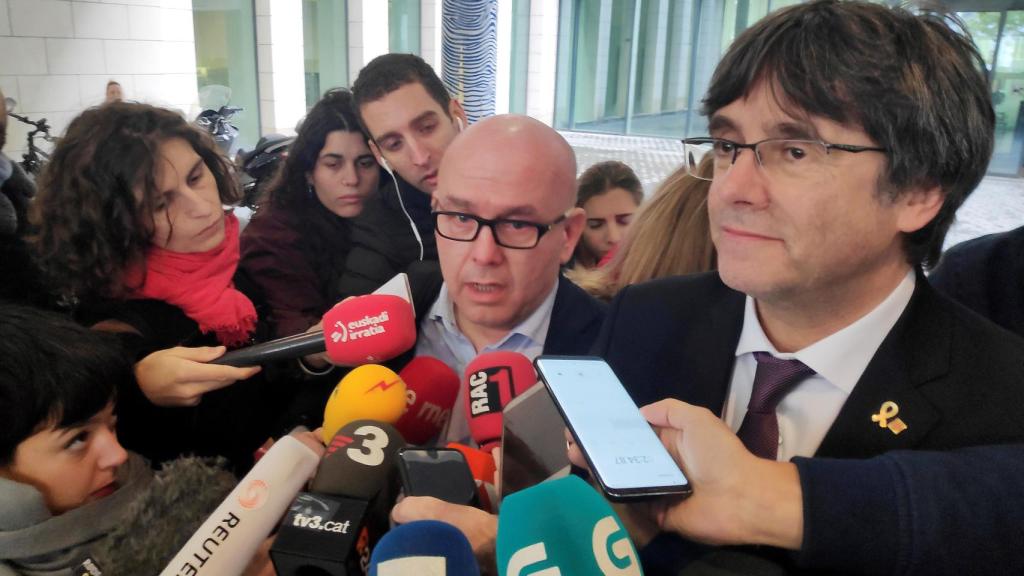 El letrado Gonzalo Boye y su cliente Carles Puigdemont.