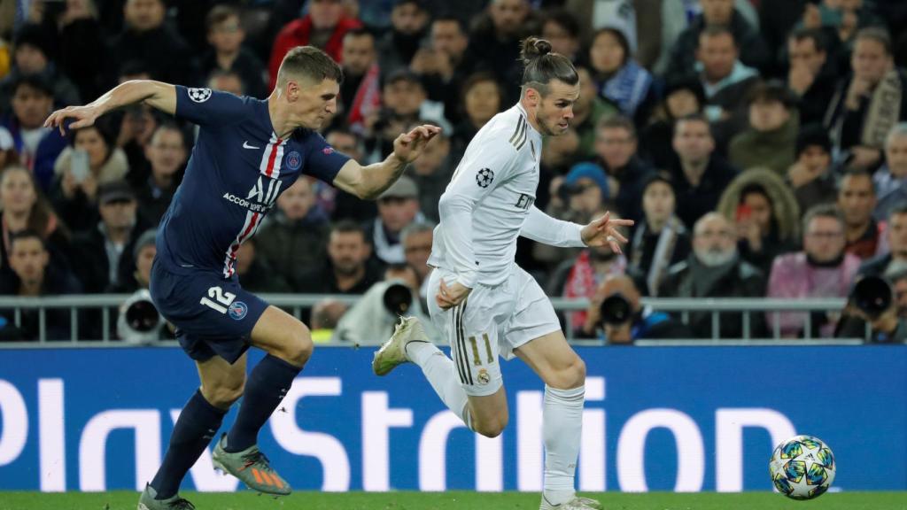 Thomas Meunier corre tras Gareth Bale