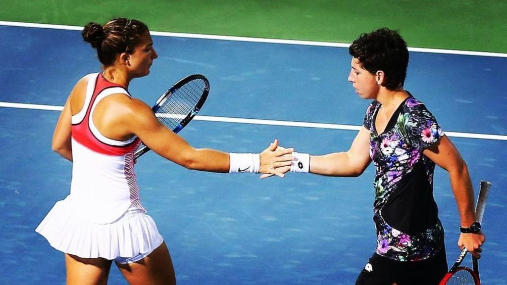 Sara Errani y Carla Suárez tras un partido