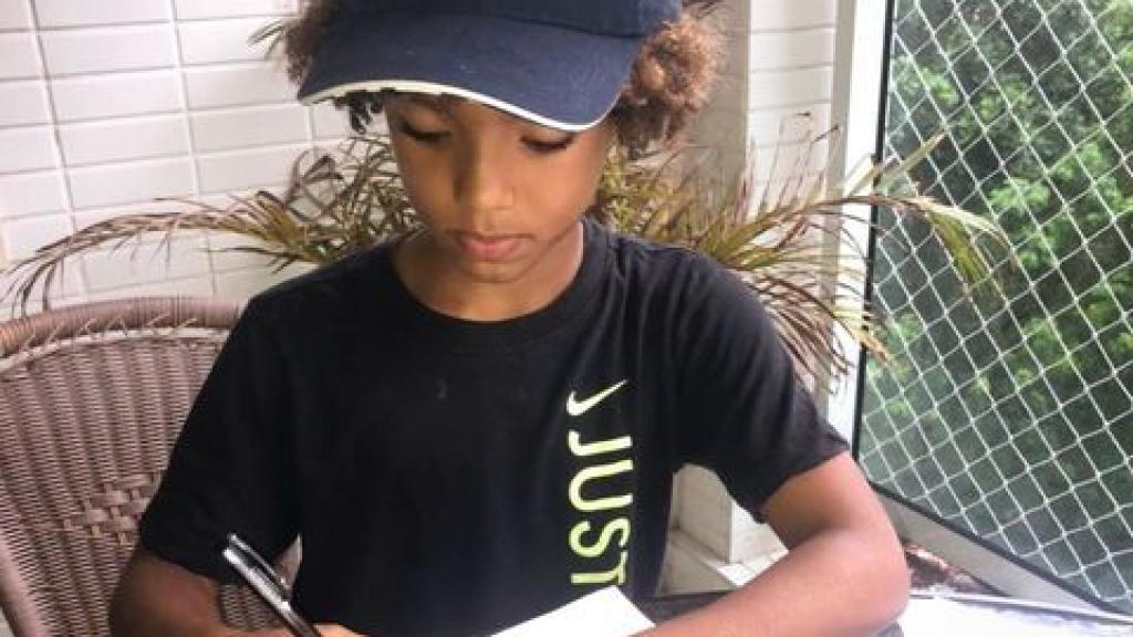 Kauan Basile, firmando su contrato con Nike