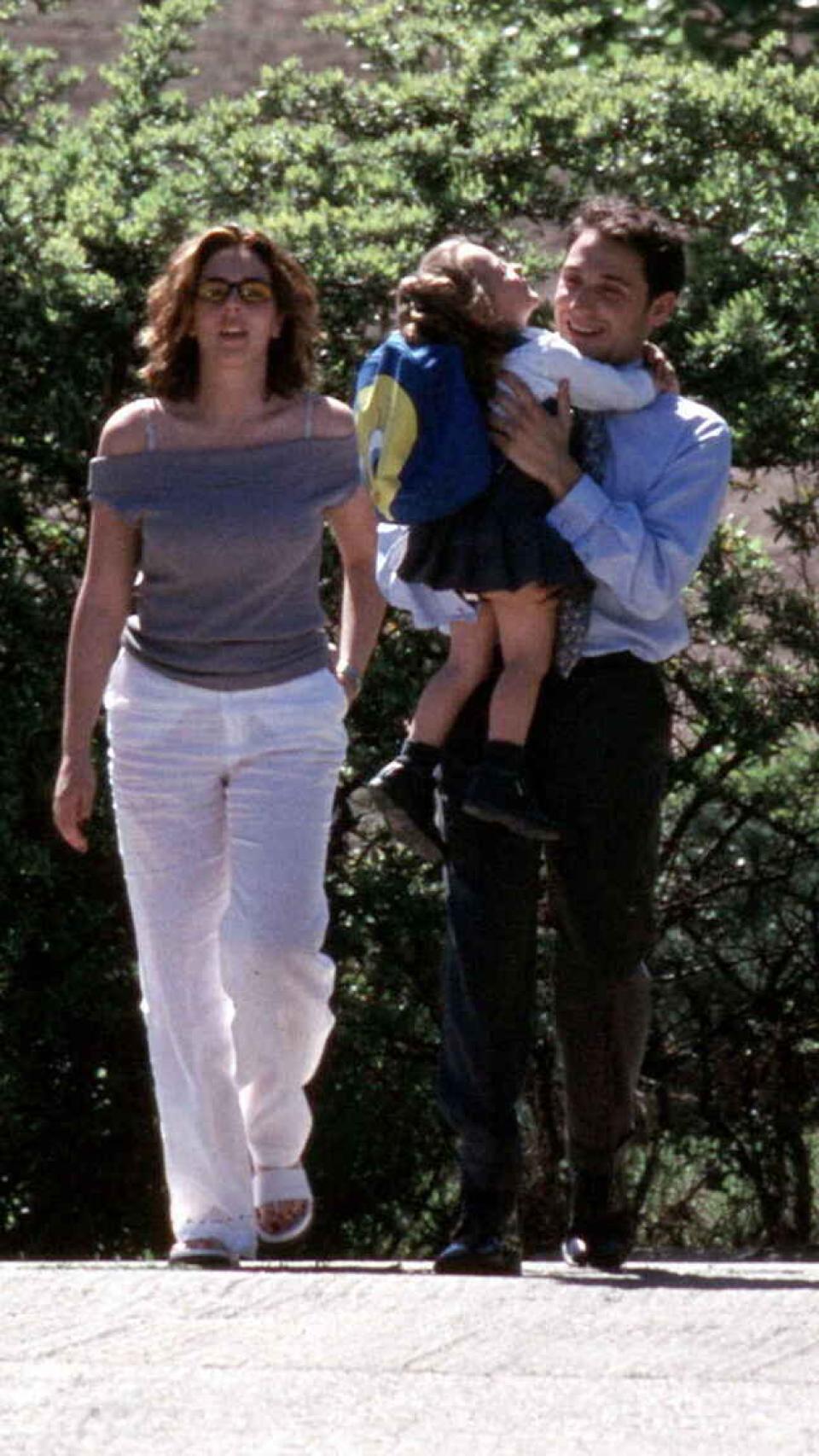Carrasco y Antonio David junto a su hija.
