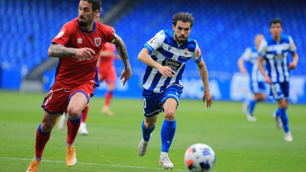 Lance del partido entre Deportivo y Numancia