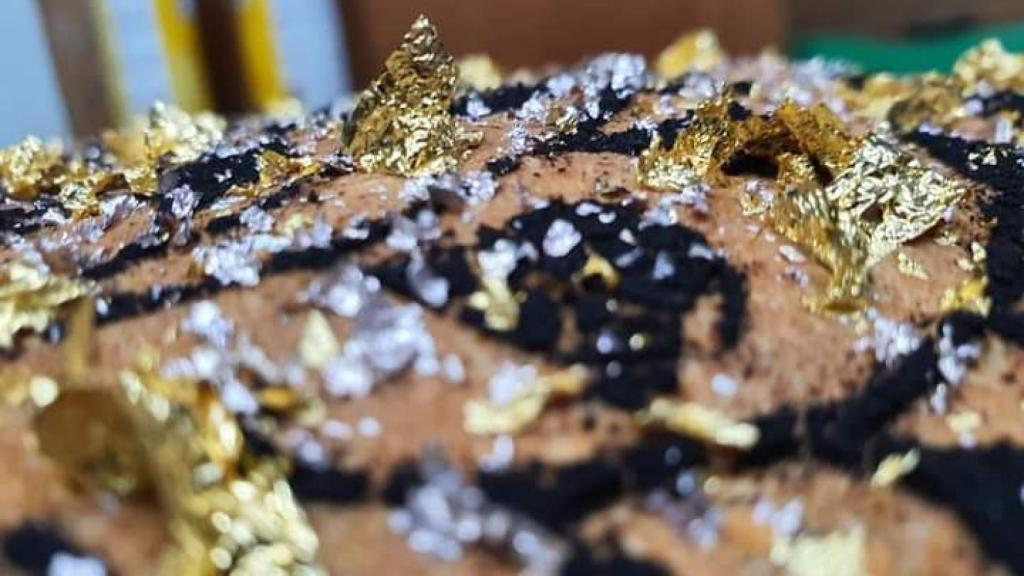 Detalles del tatuaje del pan más caro del mundo.